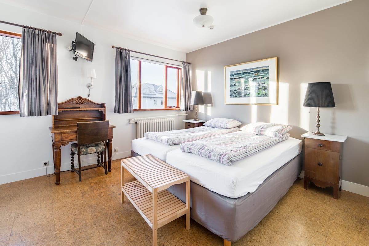 Desk, blackout curtains, free cots/infant beds, free WiFi