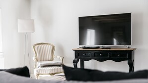 Deluxe Apartment | Television