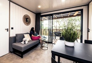 Comfort Chalet | Living area | Flat-screen TV