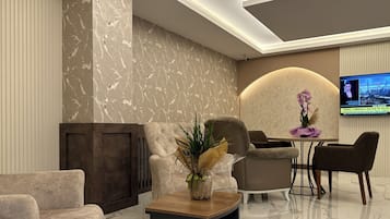 Coin salon dans le hall