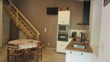 Fridge, microwave, stovetop, coffee/tea maker