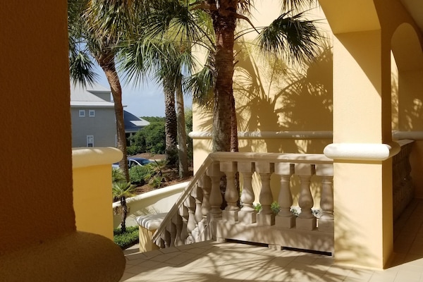 This gated community has beautifully appointed buildings and lush landscaping