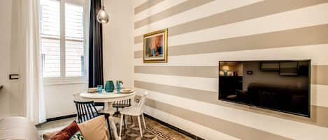 Apartment, 1 Bedroom | Living area | Flat-screen TV