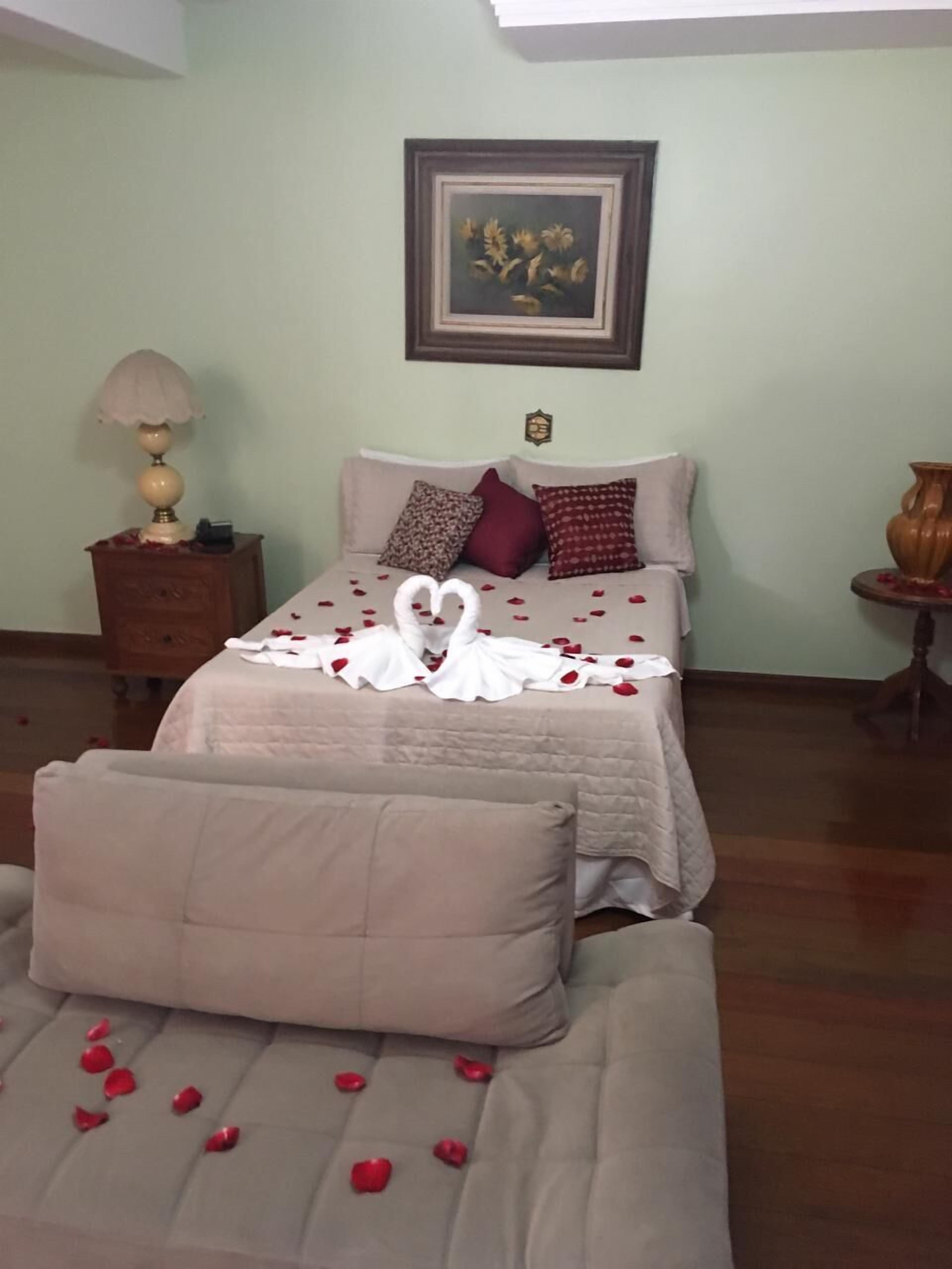 Frigobar, cortinas blackout, Wi-Fi de cortesia, roupa de cama