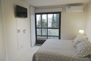 Cortinas blackout, tabla de planchar con plancha y wifi gratis
