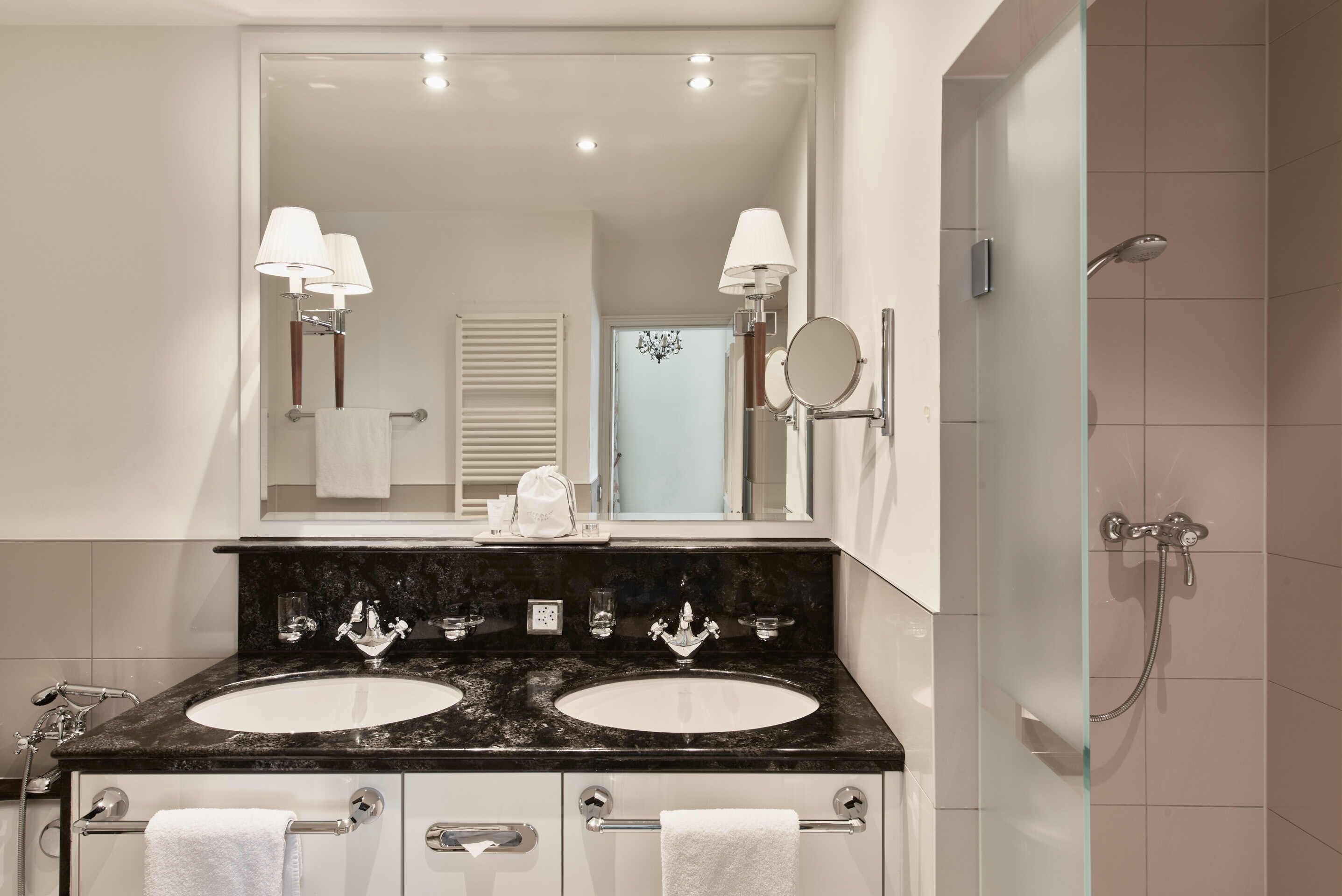 suite | bathroom | separate bathtub and shower, hair dryer, bathrobes, slippers