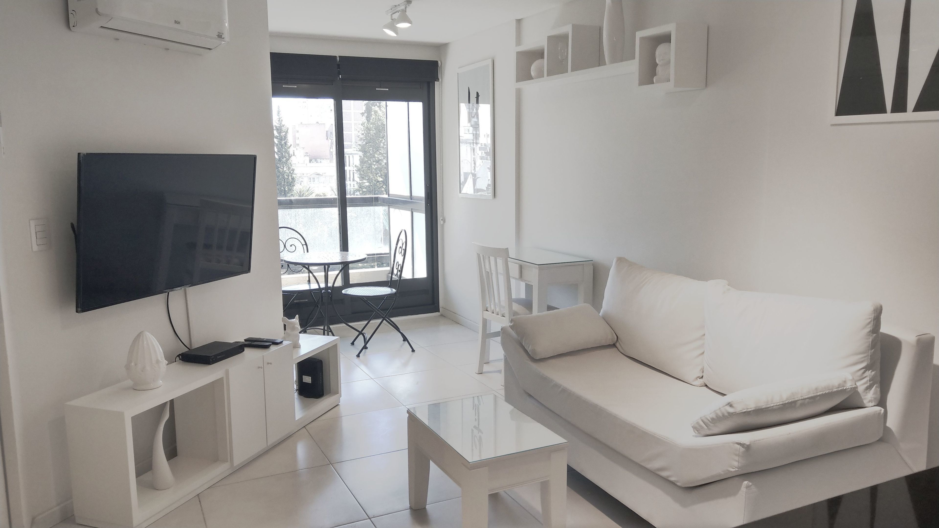 Comfort Apartment | Living room | 32-inch Smart TV with cable channels, TV