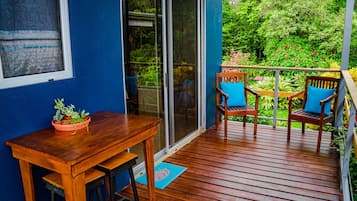 Suite estudio estándar, 1 habitación, vista al jardín | Terraza o patio