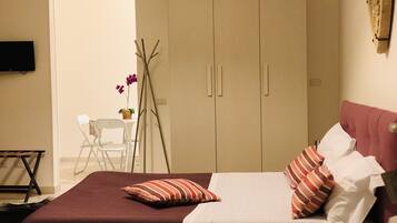 Apartamento, 1 quarto | 1 quarto, frigobar, individualmente decorados