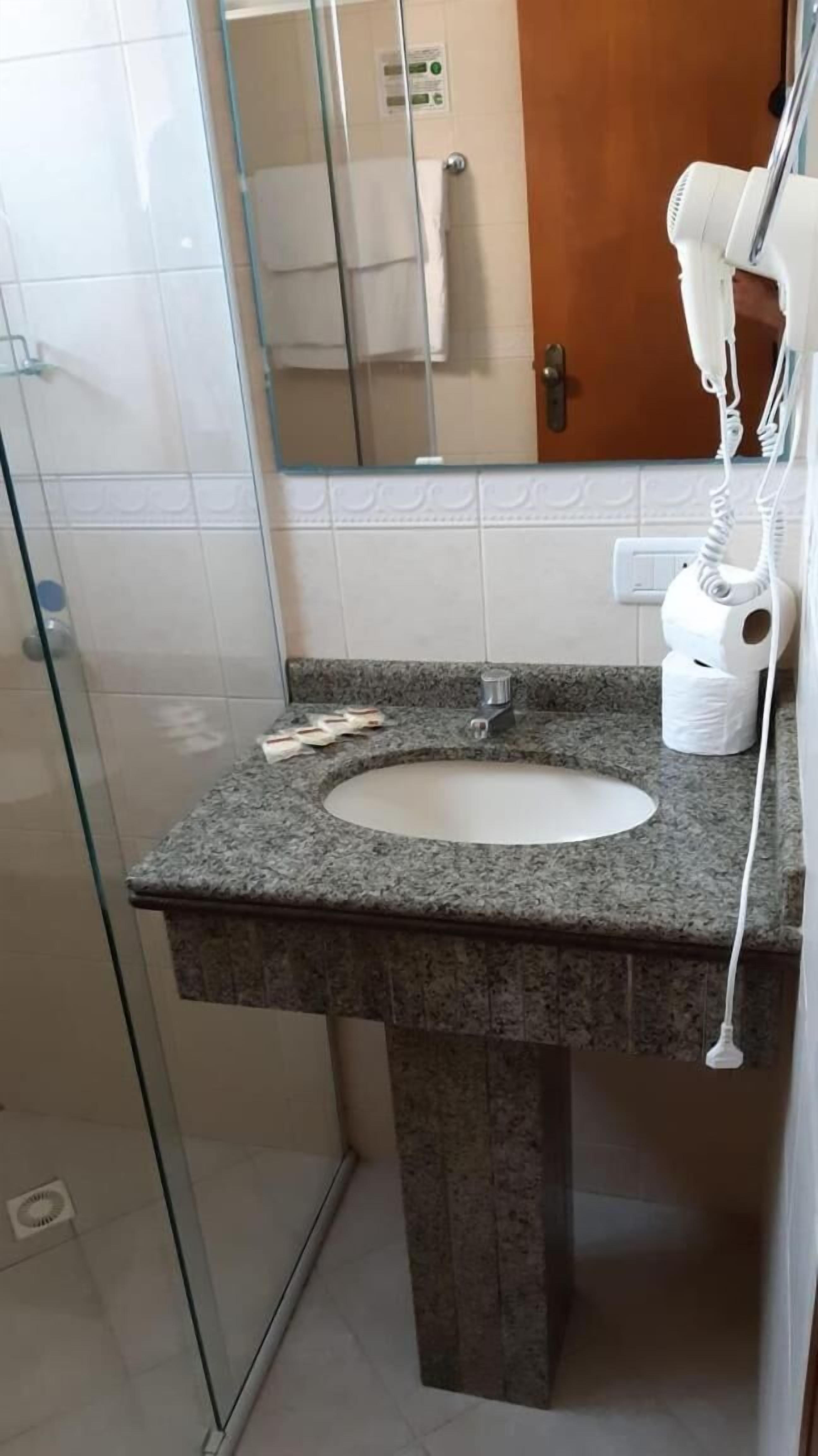 traditional apartment, 1 bedroom, patio, city view | bathroom | shower, hair dryer, towels, soap