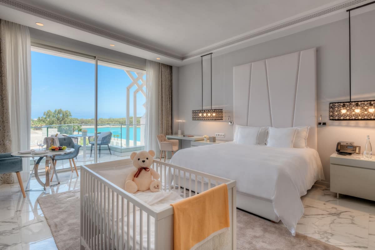 deluxe room, lagoon view | 1 bedroom, premium bedding, minibar, in-room safe