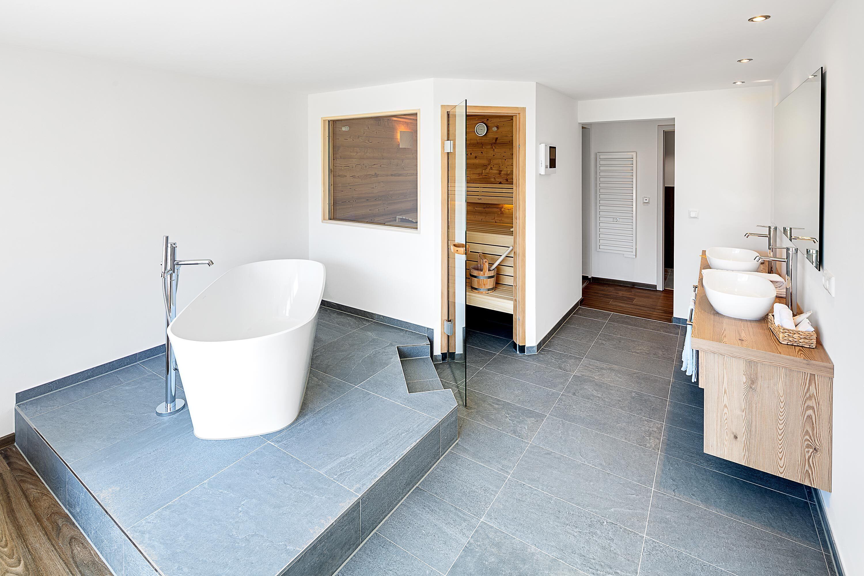 Panoramic Suite (Eichhornkobel) | Bathroom | Hair dryer, slippers, towels, soap