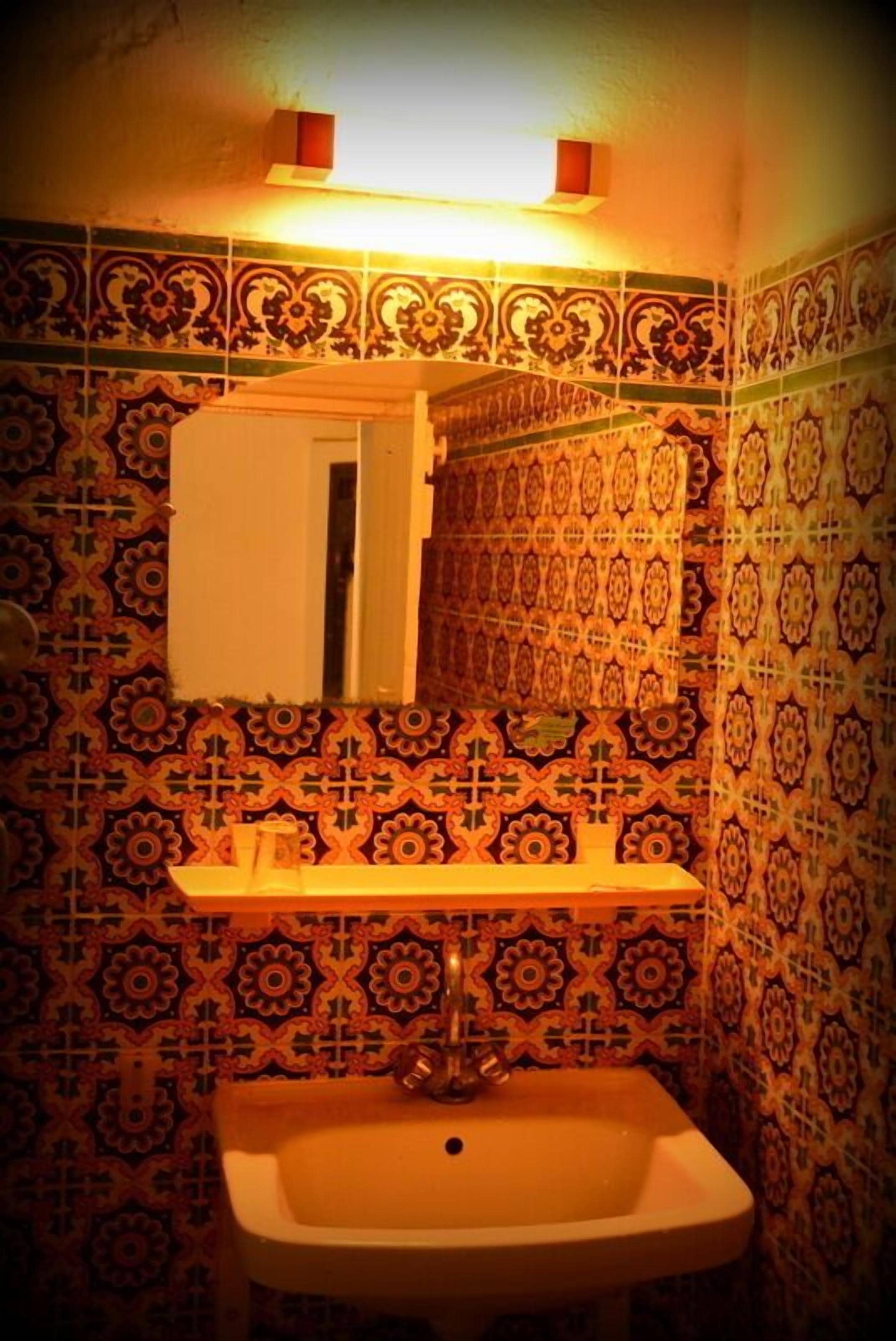 twin room | bathroom | rainfall showerhead, towels, soap, toilet paper