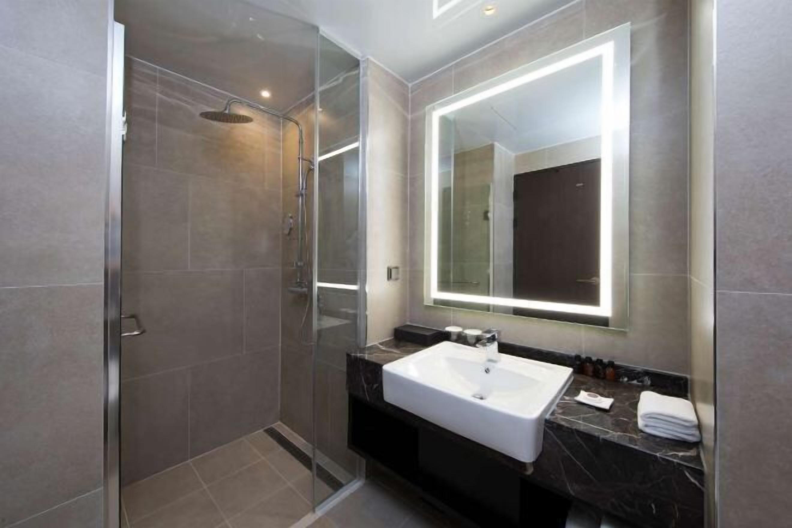 Bathroom | Shower, free toiletries, hair dryer, bathrobes