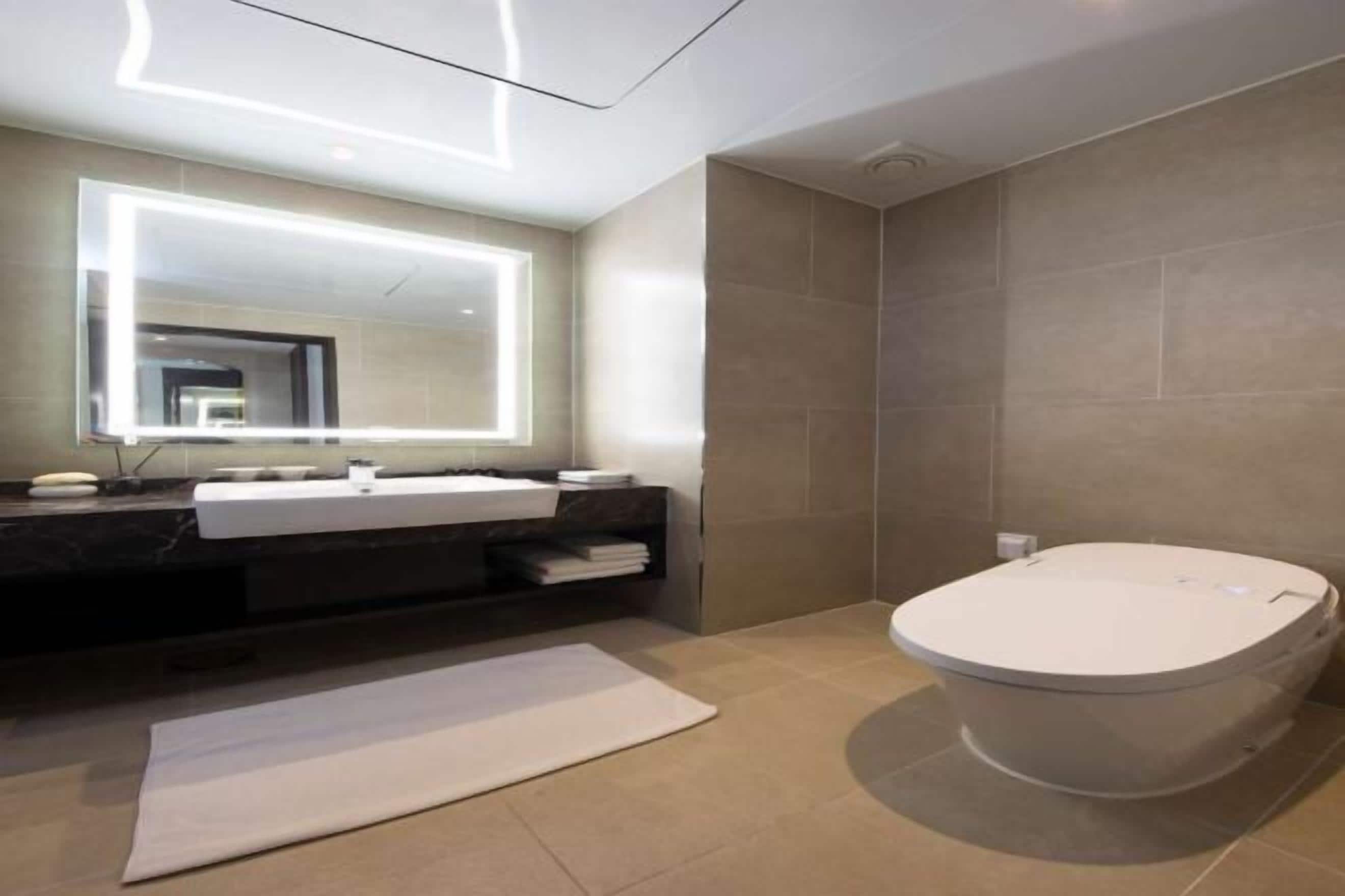 Bathroom | Shower, free toiletries, hair dryer, bathrobes