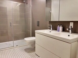 Shower, hair dryer, towels, soap