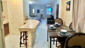 Superior Apartment, 2 Double Beds | In-room dining - Playa Suites Mazatlán (Mazatlán)