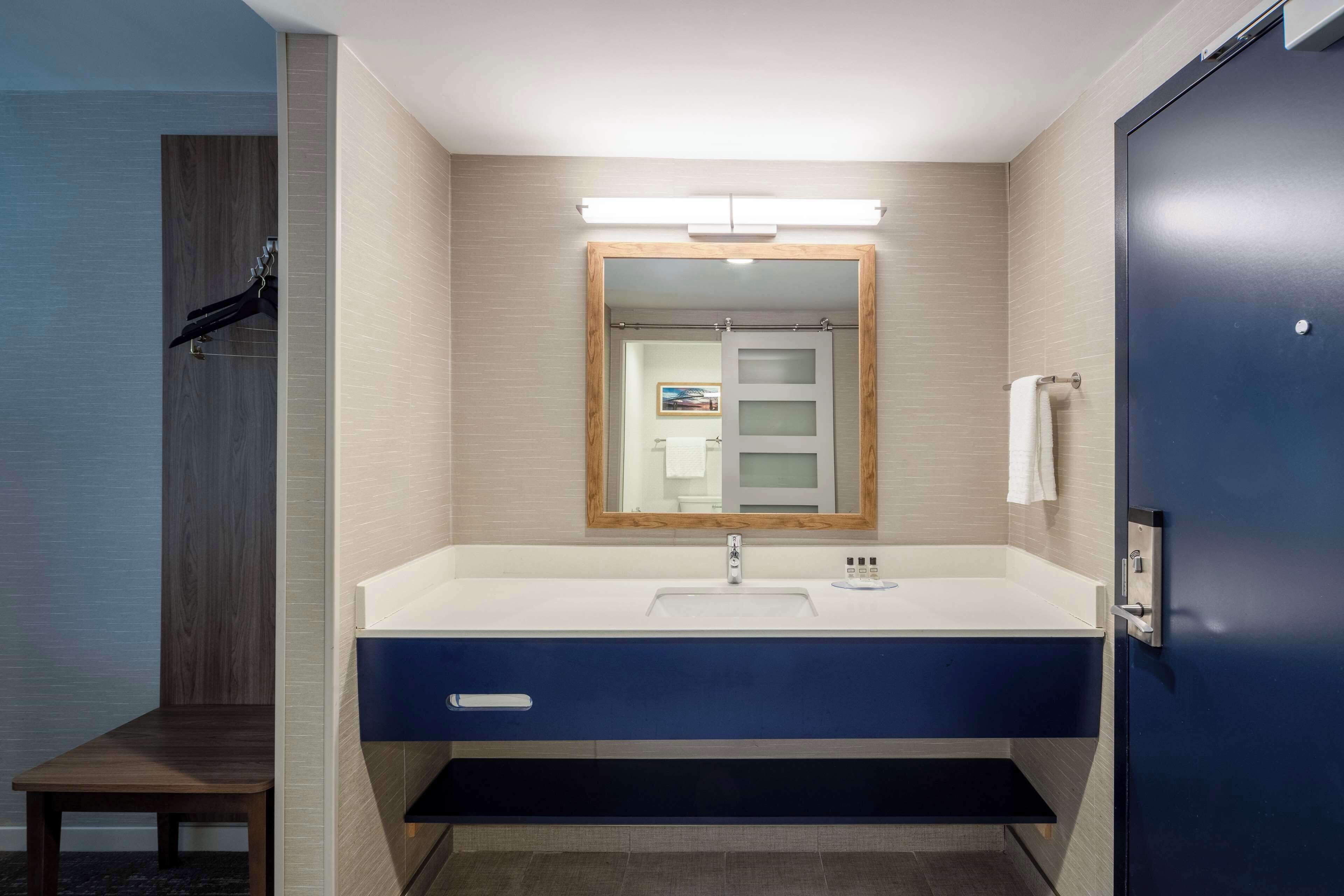 premium bedding, desk, laptop workspace, blackout curtains