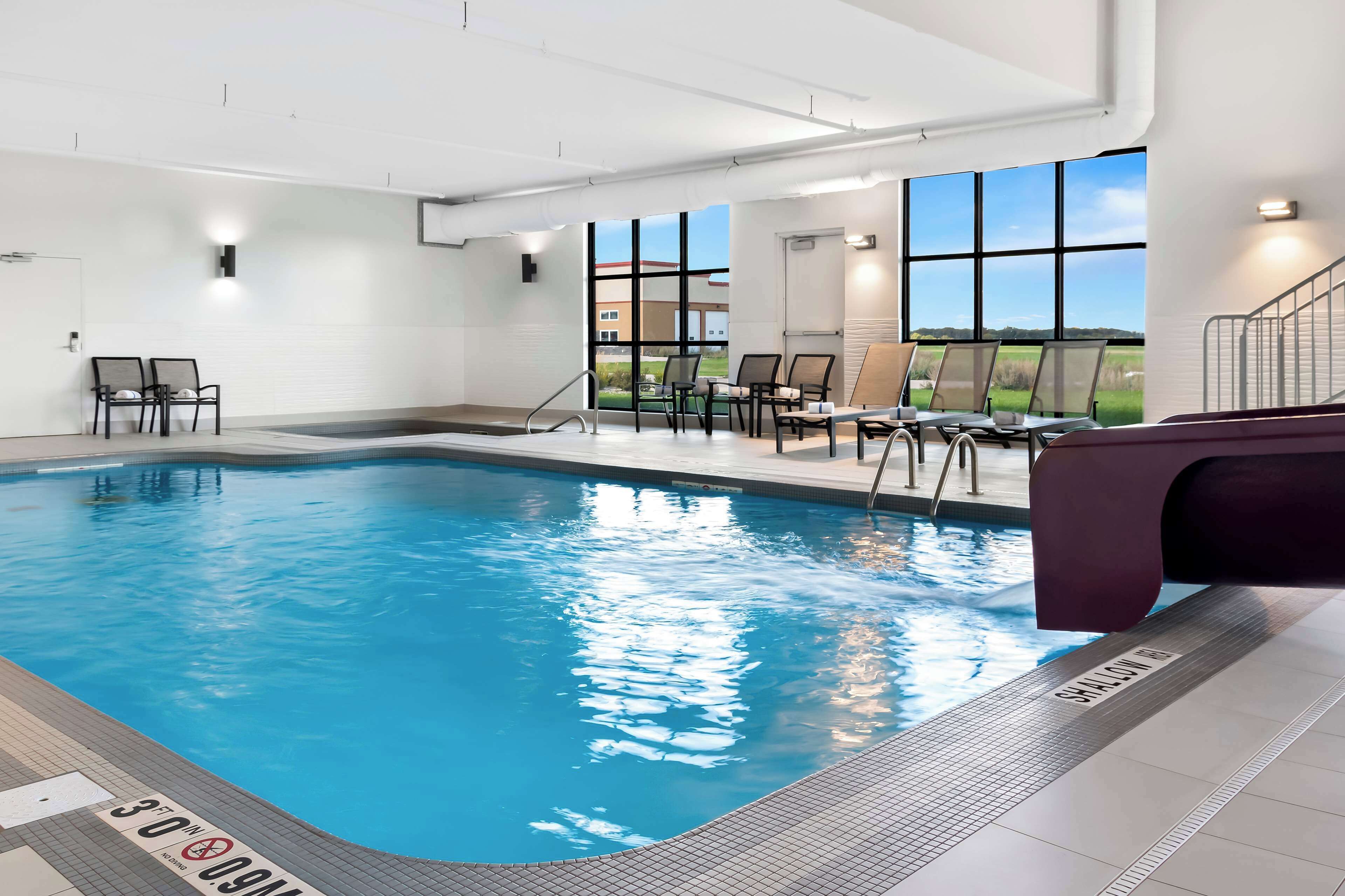 indoor pool, open 8:00 am to 11:00 pm, pool loungers