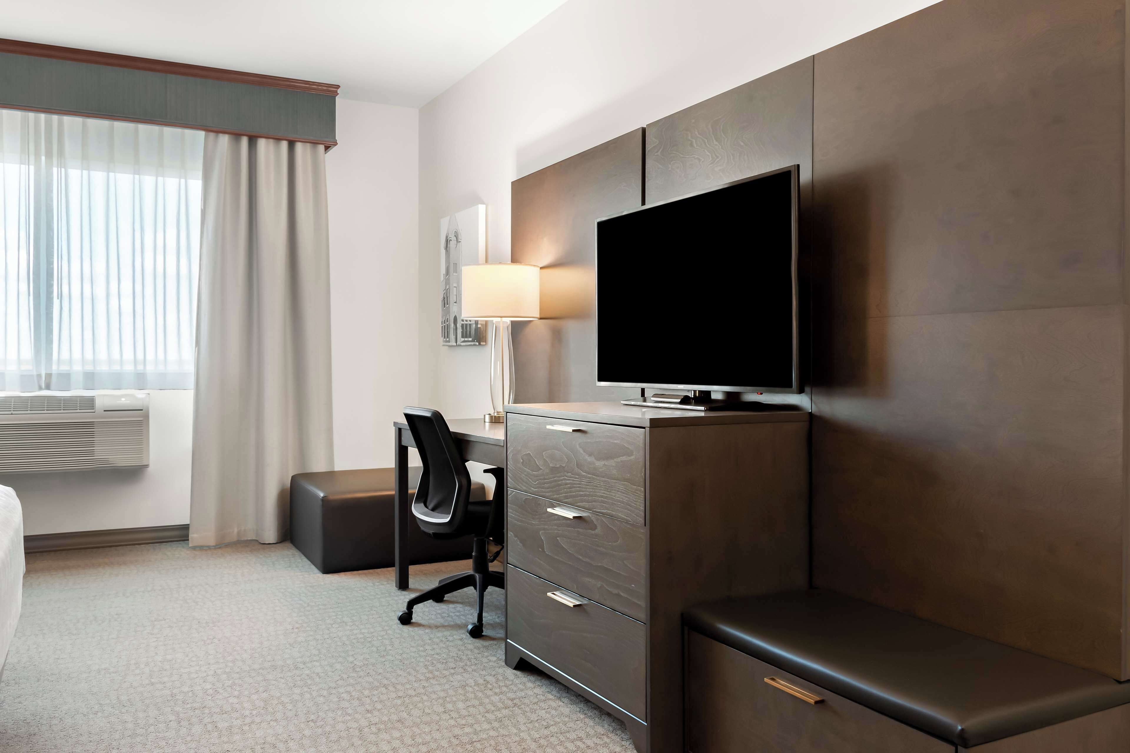 standard room, 2 queen beds, kitchenette | 1 bedroom, individually decorated, desk, laptop workspace