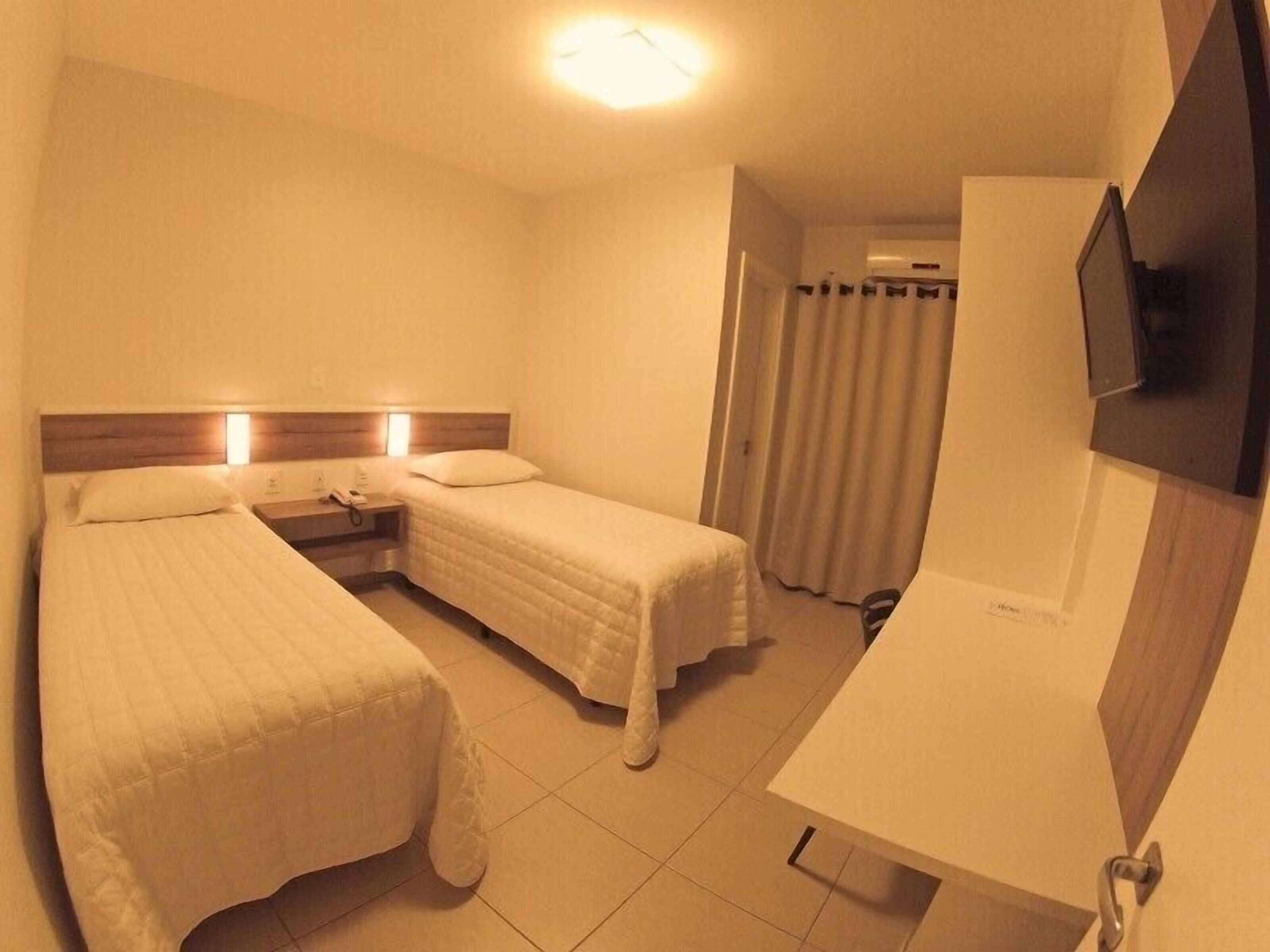 Blackout drapes, iron/ironing board, free WiFi, bed sheets