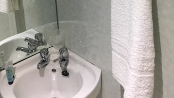 Standard Single Room | Bathroom | Shower, towels, soap, shampoo