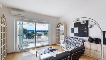 Villa, Private Pool, Sea View | Living room | Flat-screen TV