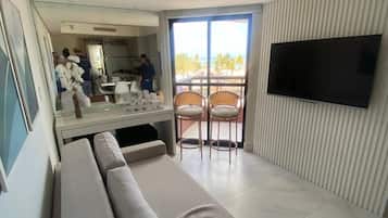 Comfort Studio | Living area | 32-inch TV with cable channels