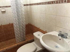 Deluxe Double Room | Bathroom | Combined shower/tub, rainfall showerhead, free toiletries, towels