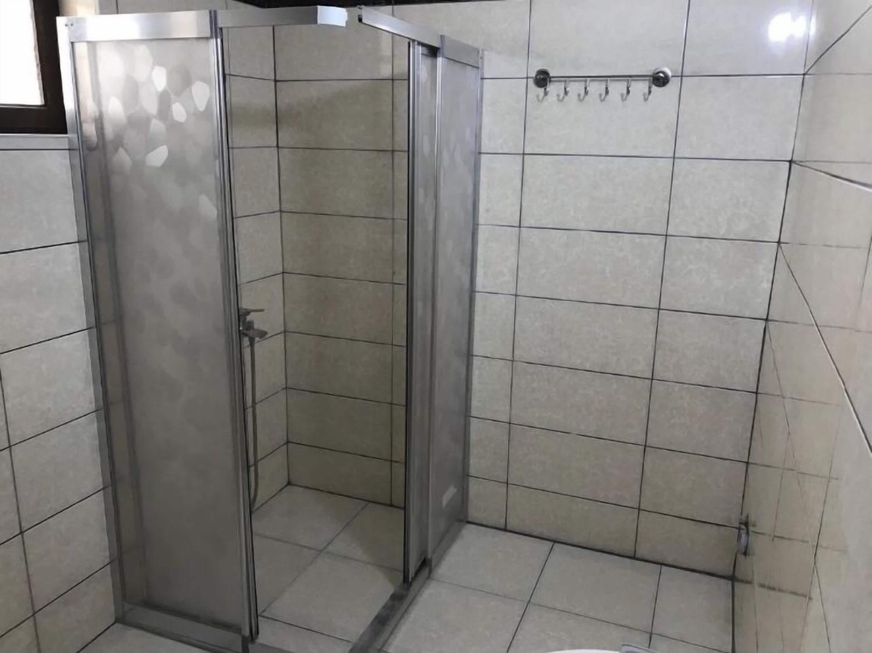 family quadruple room | bathroom | shower, hair dryer, slippers, towels