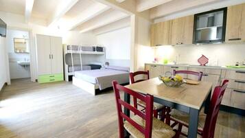 Studio | Private kitchen | Full-size fridge, stovetop, cookware/dishes/utensils