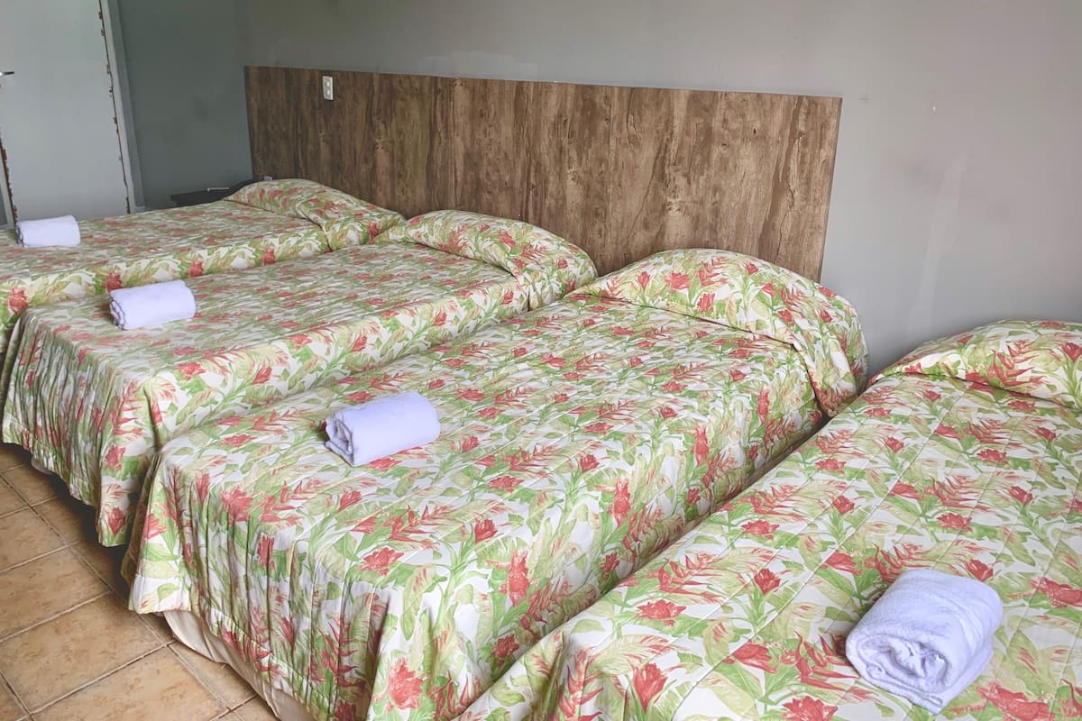 Standard Quadruple Room | Blackout drapes, iron/ironing board, bed sheets