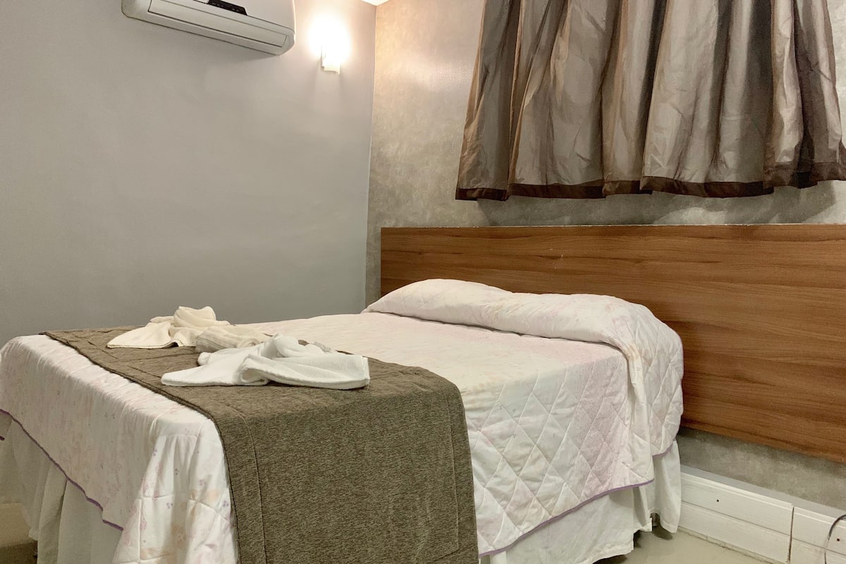 Blackout drapes, iron/ironing board, bed sheets