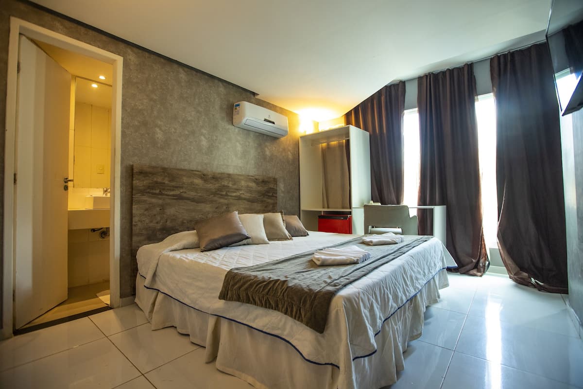 Standard Double Room | Blackout drapes, iron/ironing board, bed sheets