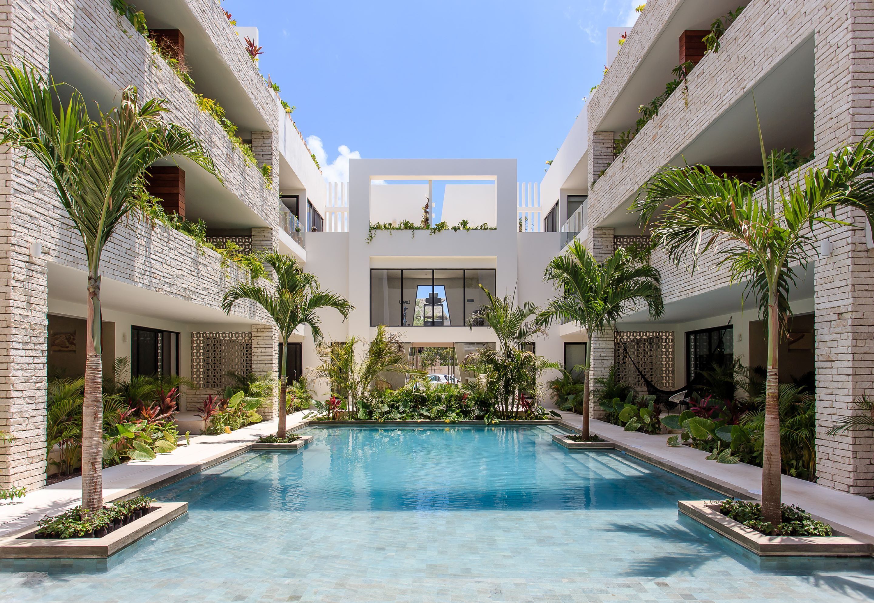 2 outdoor pools, pool umbrellas, pool loungers