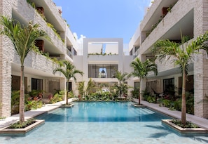 2 outdoor pools, pool umbrellas, sun loungers