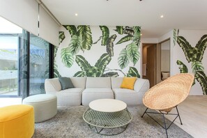 Deluxe Penthouse, Pool Access | Living area | Flat-screen TV, Netflix, first-run movies