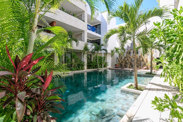 2 outdoor pools, pool umbrellas, sun loungers