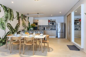 Deluxe Penthouse, Pool Access | Private kitchen | Microwave, coffee/tea maker, electric kettle, toaster