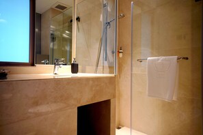 Shower, free toiletries, hair dryer, slippers