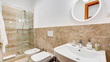 Shower, eco-friendly toiletries, hair dryer, bidet