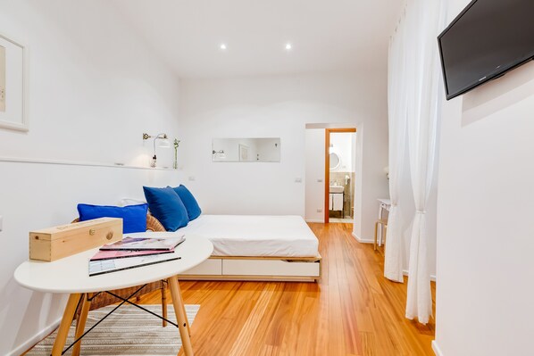1 bedroom, desk, iron/ironing board, travel crib