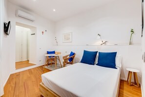 1 bedroom, desk, iron/ironing board, travel crib