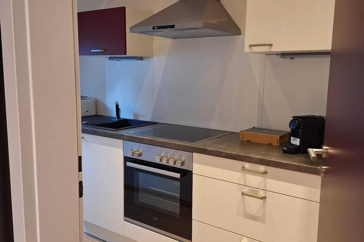 grand room, courtyard area (comfort) | private kitchen