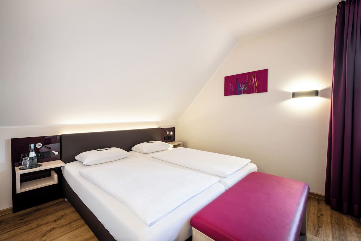 Family Room, Courtyard Area (Standard) | In-room safe, free WiFi, bed sheets, wheelchair access