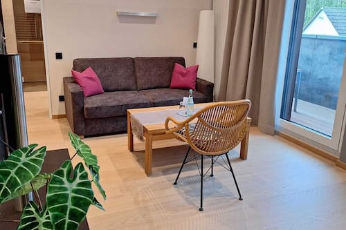 Grand Room, Courtyard Area (Comfort) | Living area | Flat-screen TV