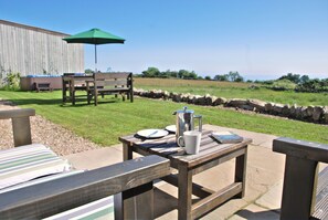 Outdoor dining - Stunning Sea Views, Beautiful Country Cottage, Hot-Tub | Ravenscar, North Yorks (Scarborough)