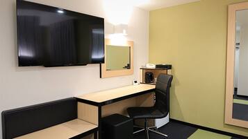 Desk, blackout drapes, soundproofing, free WiFi