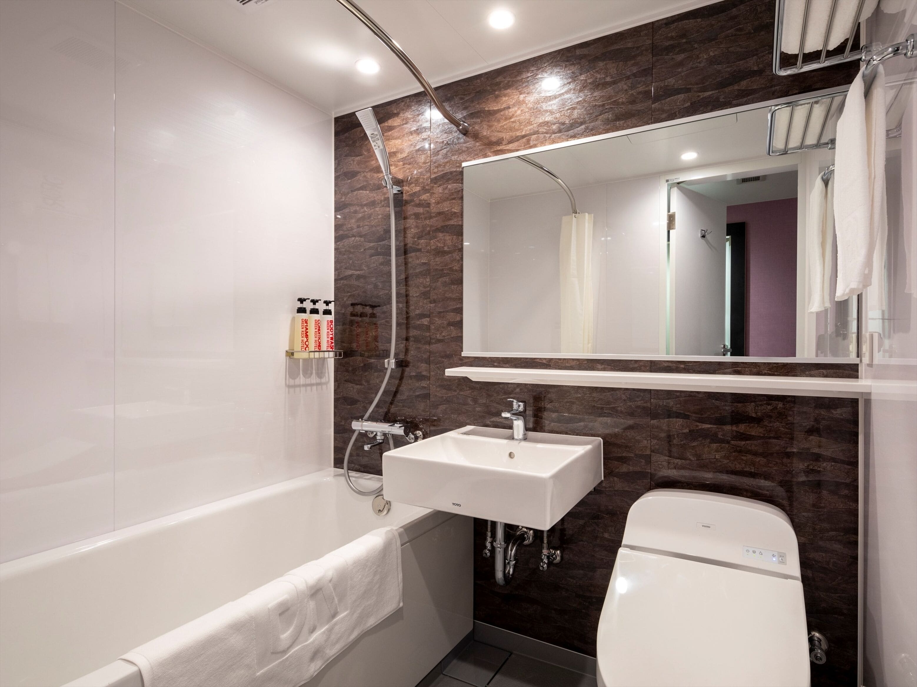 separate bathtub and shower, free toiletries, hair dryer, slippers