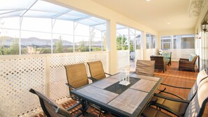 Outdoor dining - STUNNING 9 BED POOL HOME! Two Resorts included in your reservation! (Davenport)
